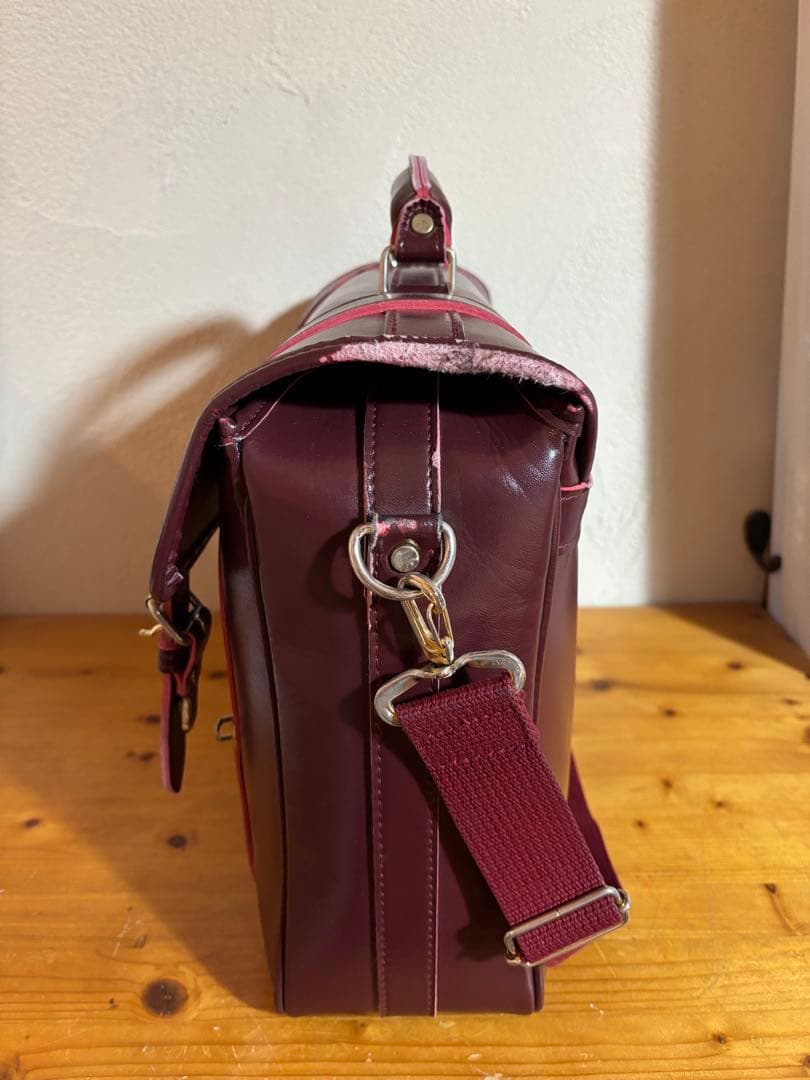 就実高校　通学バッグ　エンジ