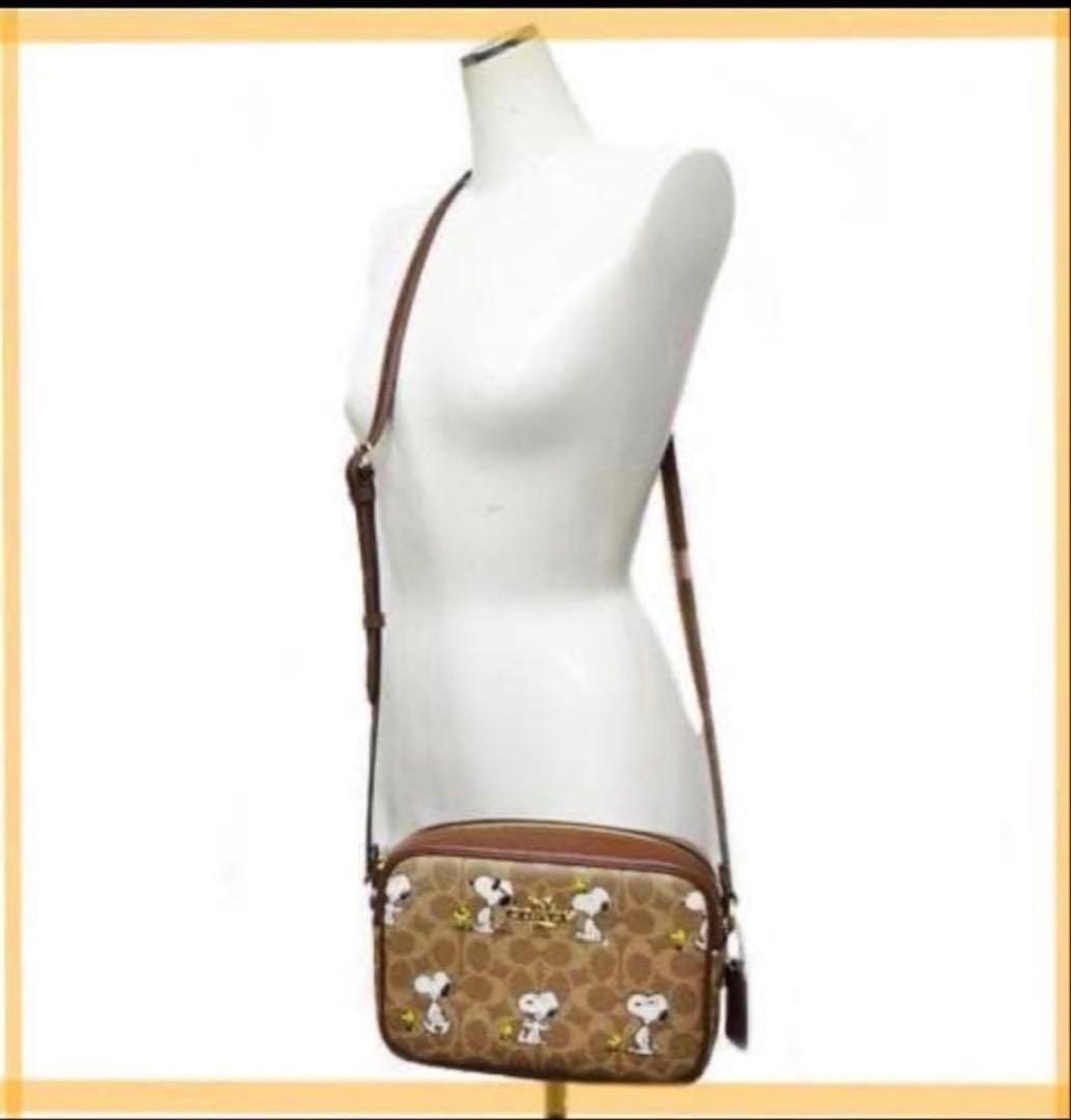 たおたろー　コーチCOACHスヌーピーコラボシグネチャー斜め掛けショルダー