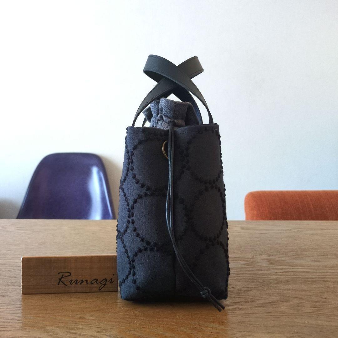 【1566】あおりポケットの巾着バッグ＊ミナペルホネン