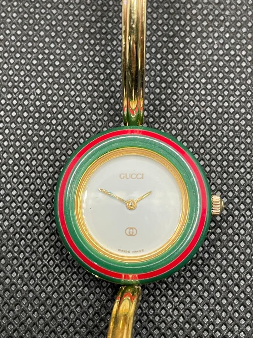 グッチ チェンジベゼル 1100-L ベゼル9個バングルウォッチ ケース付き