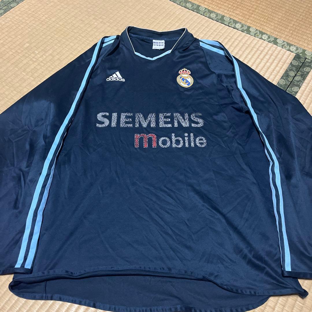 サッカーウェア二枚まとめ売りマンチェスターU Lサイズ　レアル・マドリード2XO